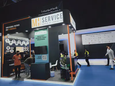 MH Service stand with visitors and an open meeting area