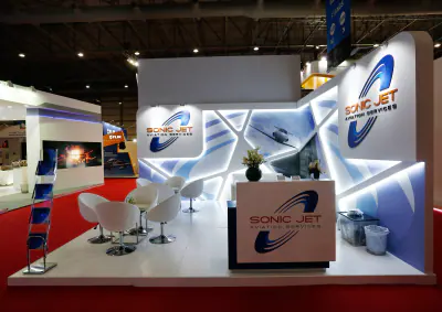 Sonic Jet Aviation stand with white angled panels and counter
