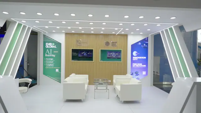 Tall custom exhibition stand structure with open sides at ADNEC Centre Abu Dhabi