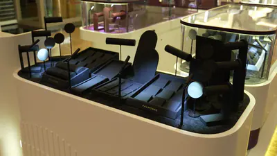 Glass-topped jewellery display case with plum interior and trays